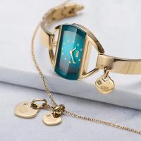 Temptress Charm Gold-Teal Kadın Saat – Kalp Charm & Kristal Detaylı